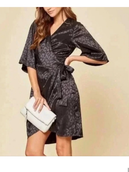 Savanna Jane Dresses & Skirts - NWOT Savanna Jane black medium cheetah wrap dress little black dress